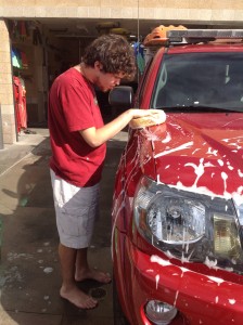 Jeremy washing the patrol truck